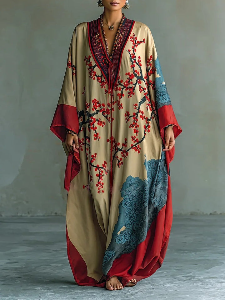 Lara | Elegancka letnia maxi sukienka z kwiatowym motywem i rękawami typu batwing