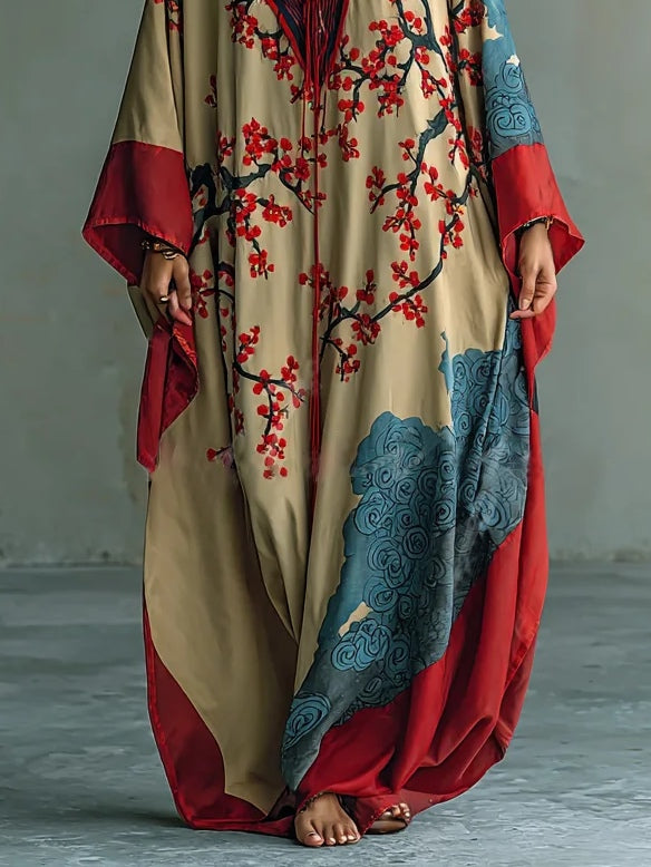 Lara | Elegancka letnia maxi sukienka z kwiatowym motywem i rękawami typu batwing